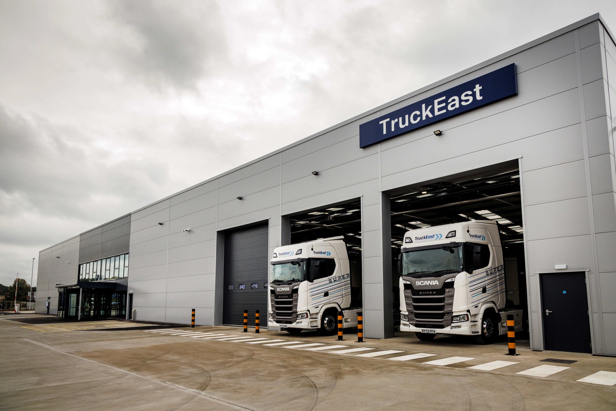 TruckEast branch with two Scania tractor units in the workshop