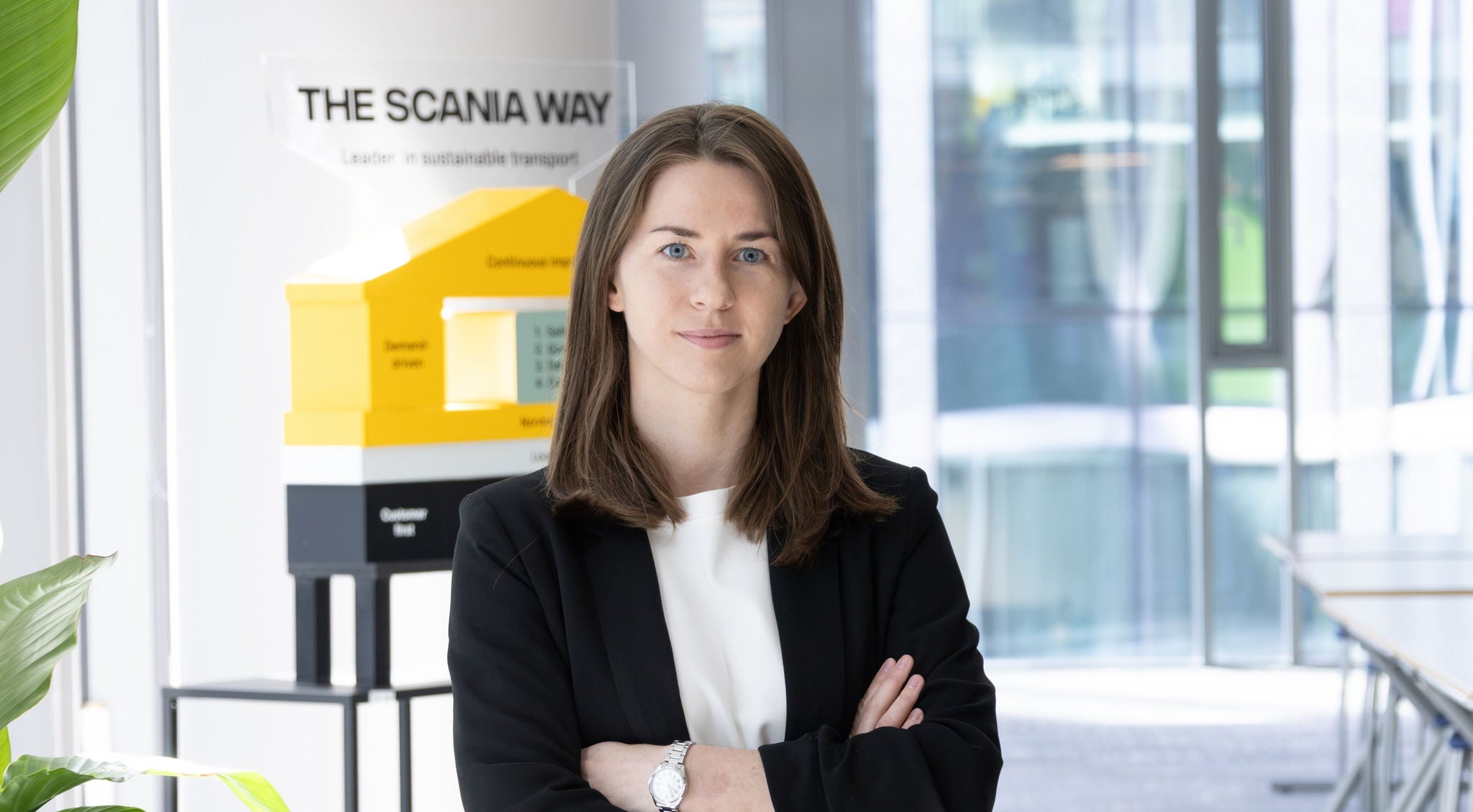 Woman in front of the Scania Way
