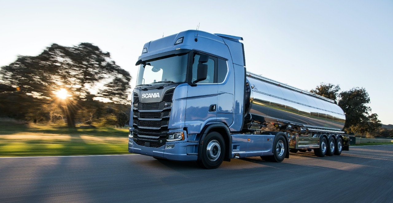 A Scania tractor unit pulling a tanker