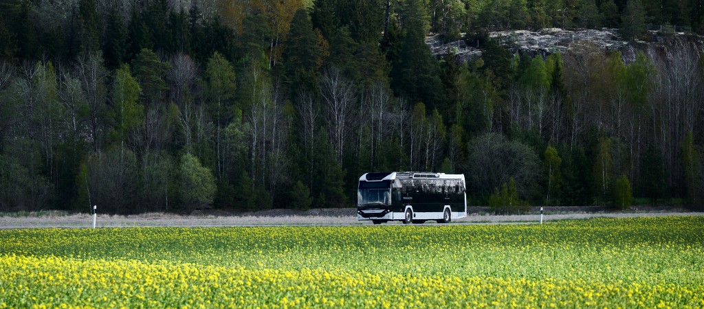 Scania bus driving down the hill