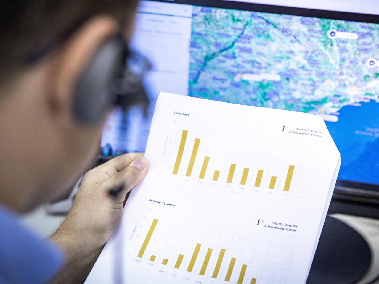 Man looking at graphs