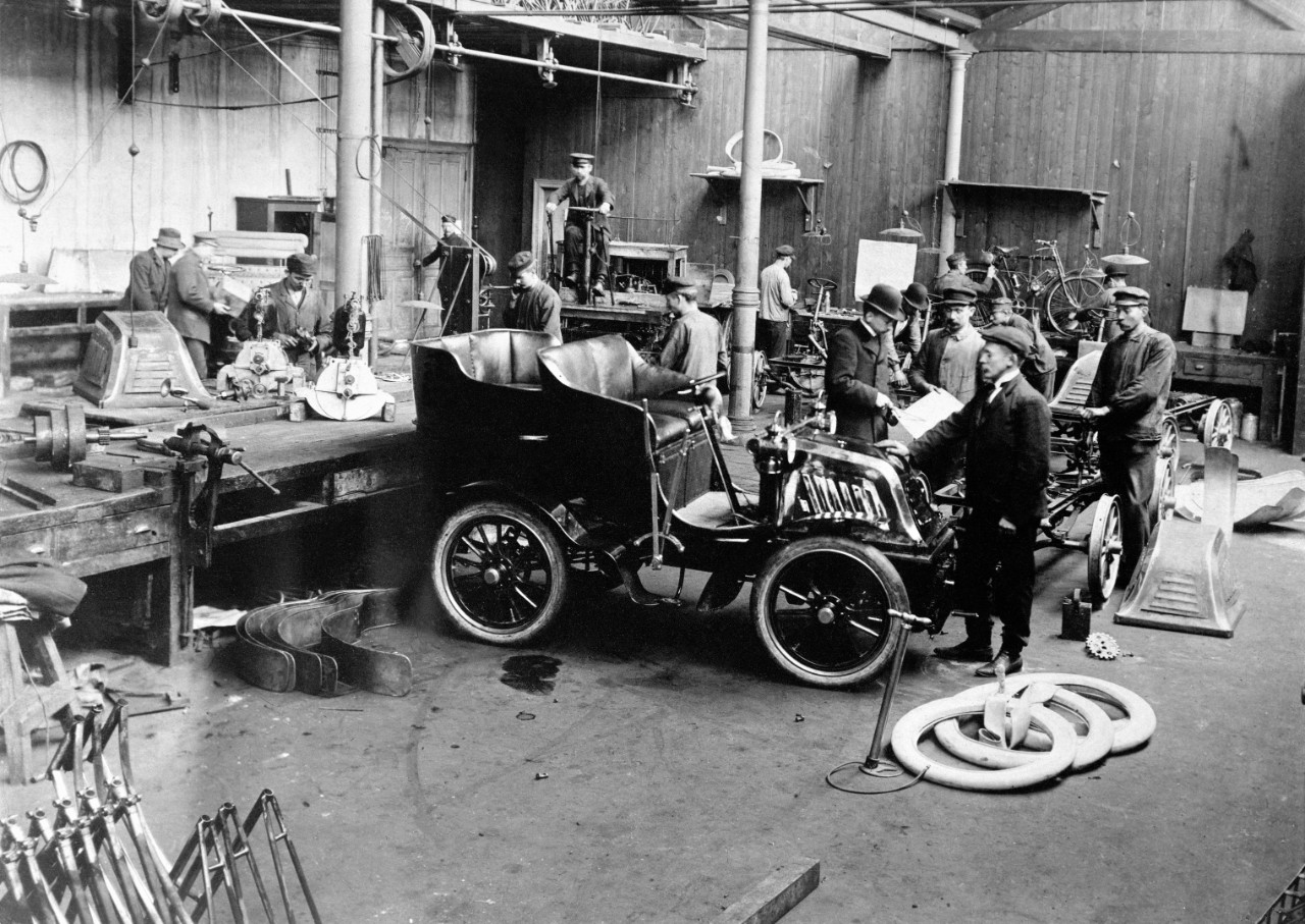 People working in an old factory