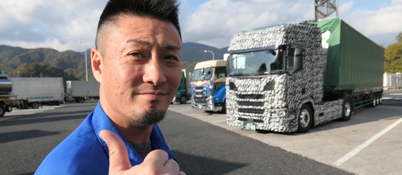 Leaving Tokyo in a new generation Scania
