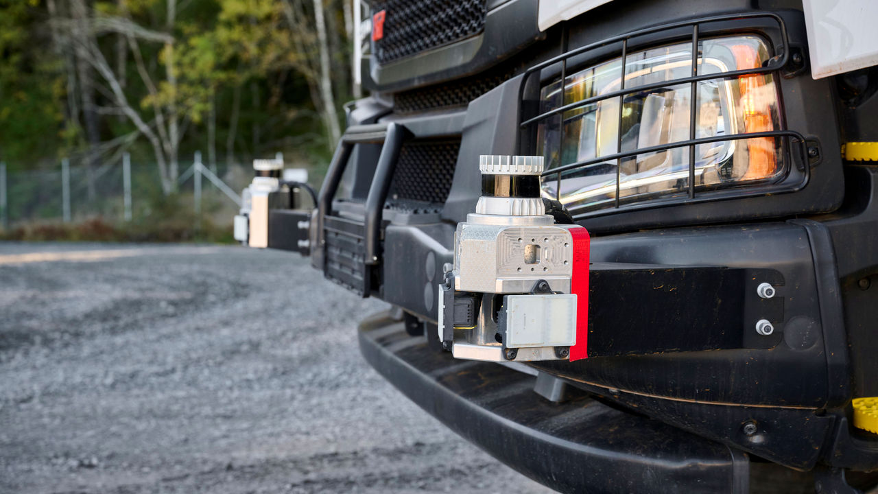 An autonomous truck with sensors in the front.