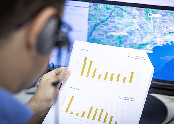 Man looking at graphs