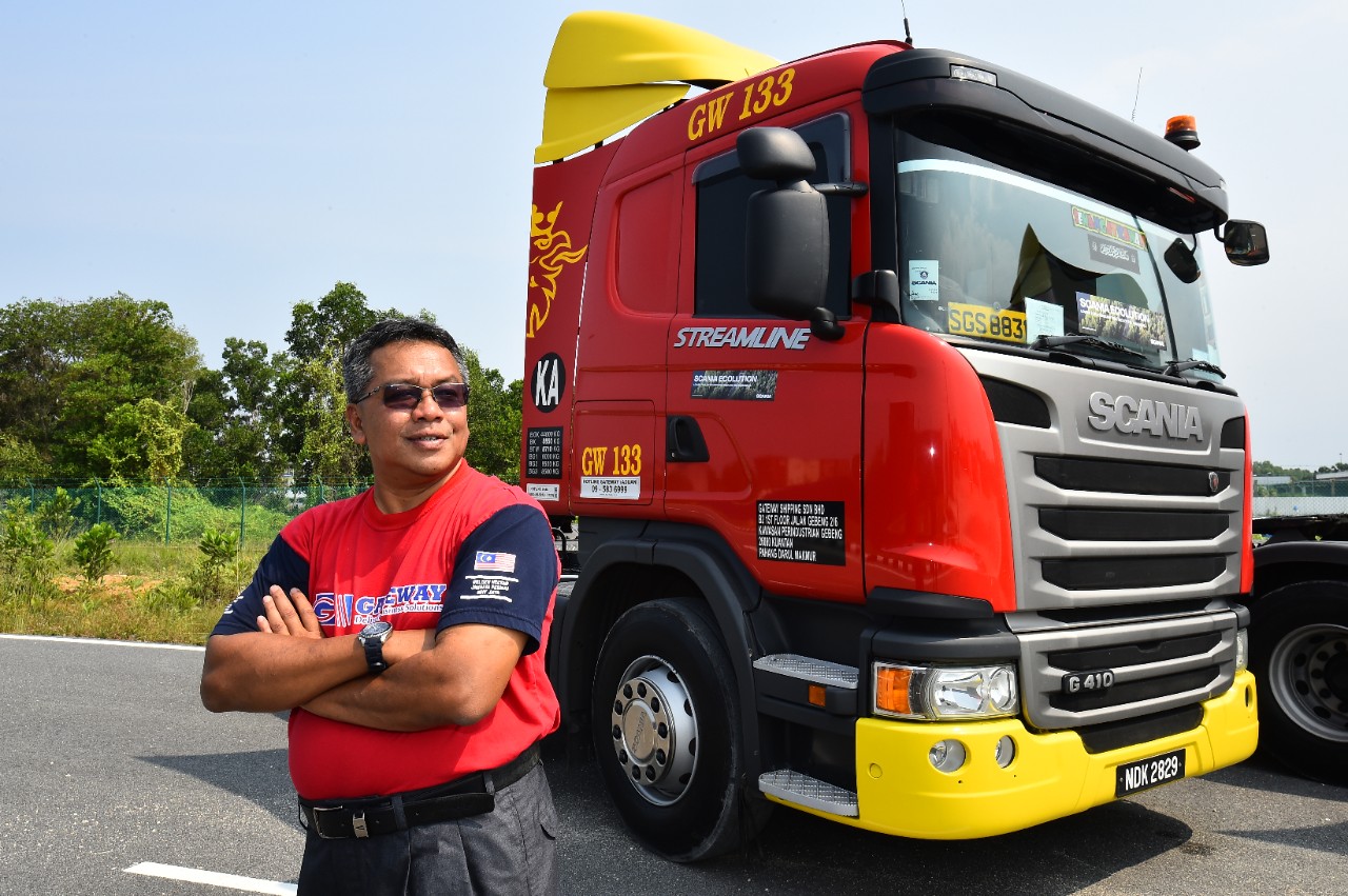Mr. Rishinsa with Scania truck