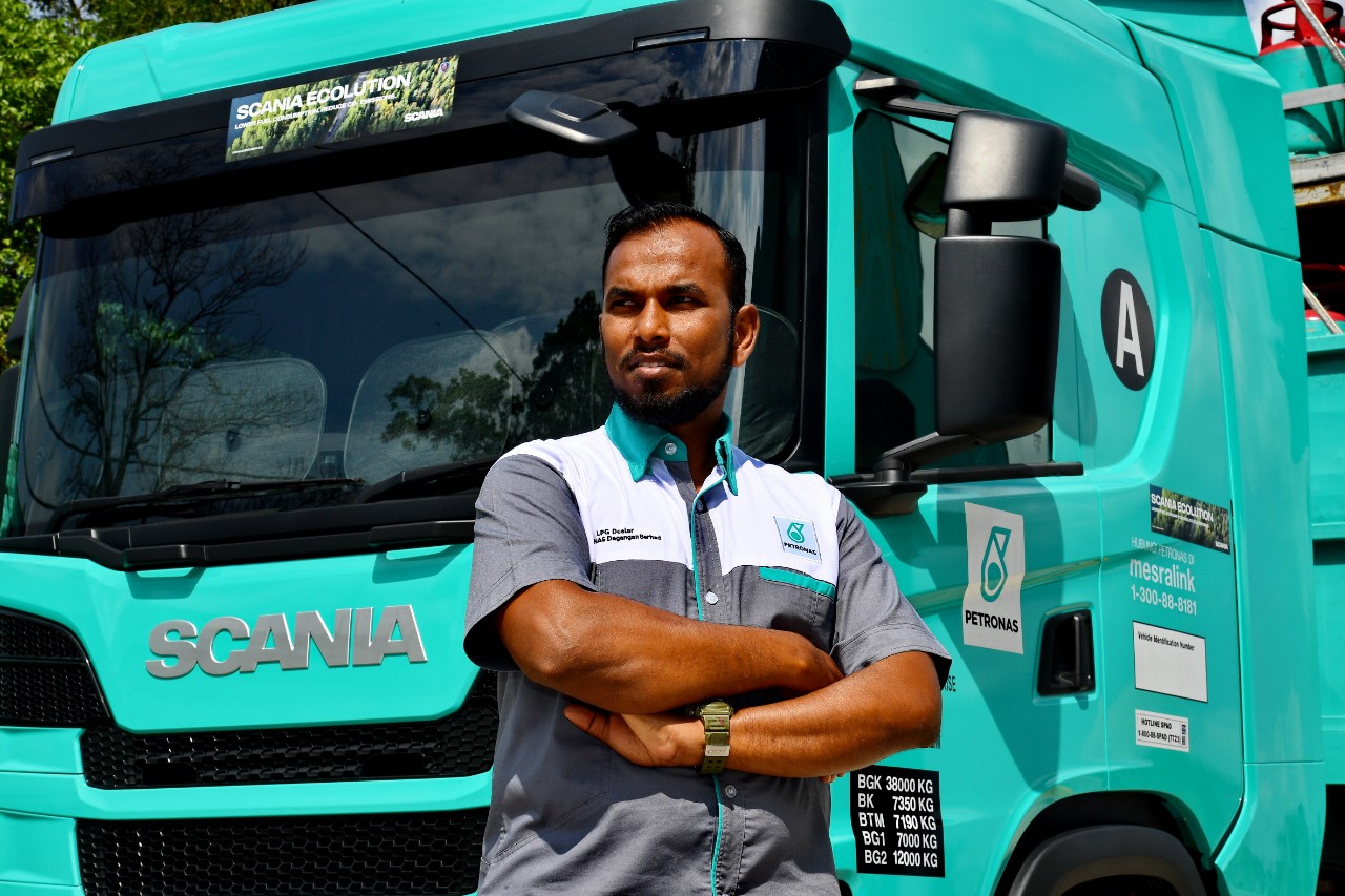 MOHD SIDEK AMZAH with Scania trucks