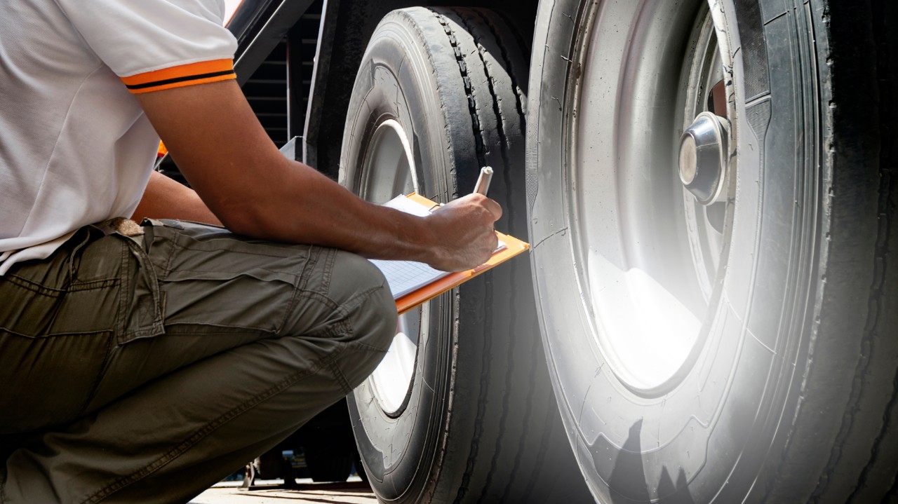 Man checking tyres