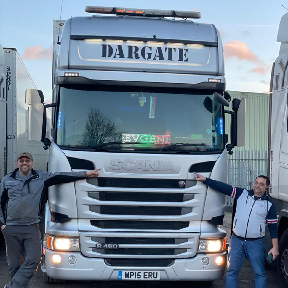 Stefan and a colleague infront of a Scania