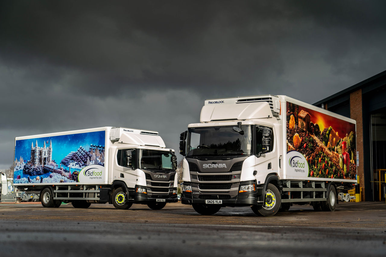 Two Scania P 250 rigids parked together