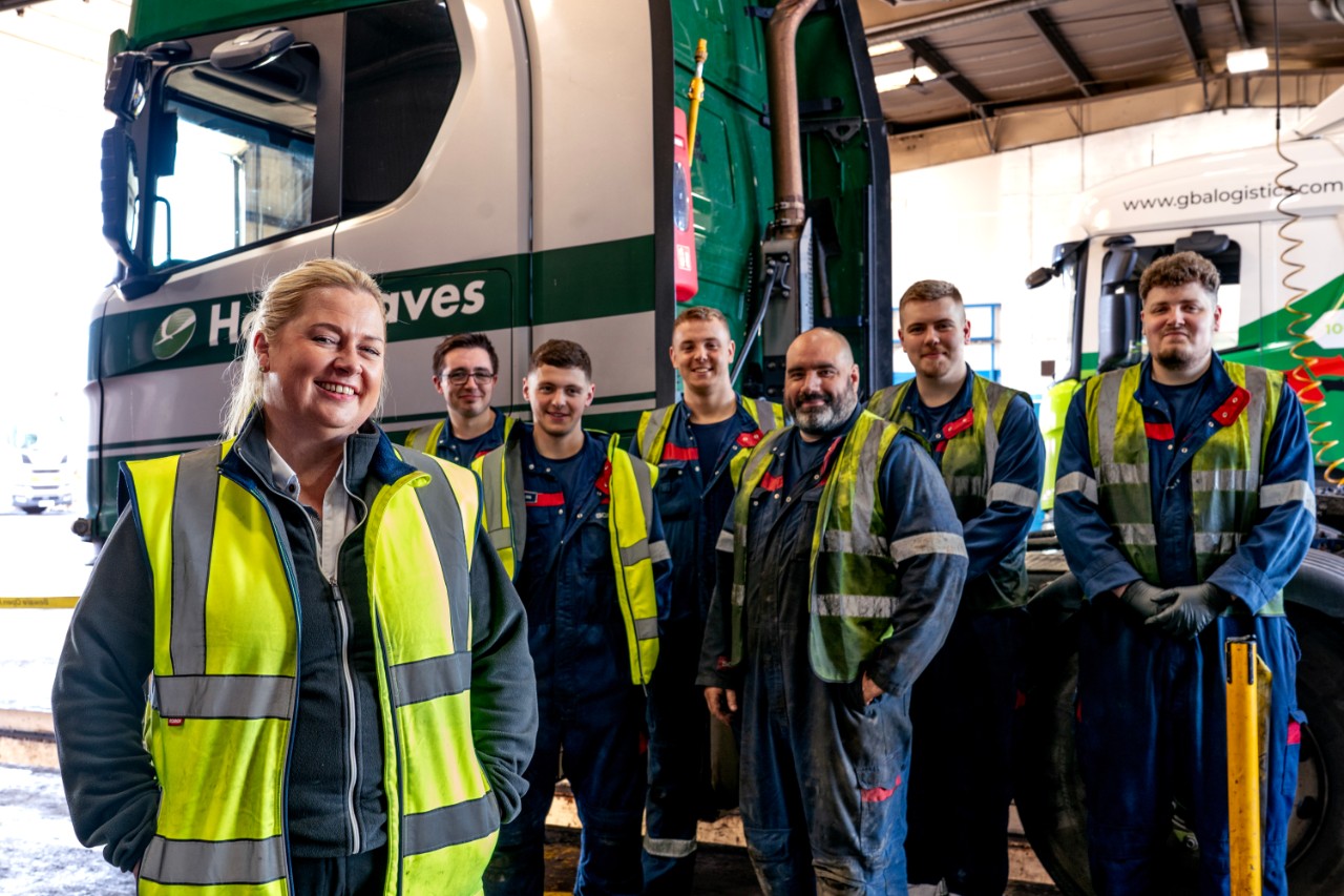 General Manager at Scania UK, standing with their team