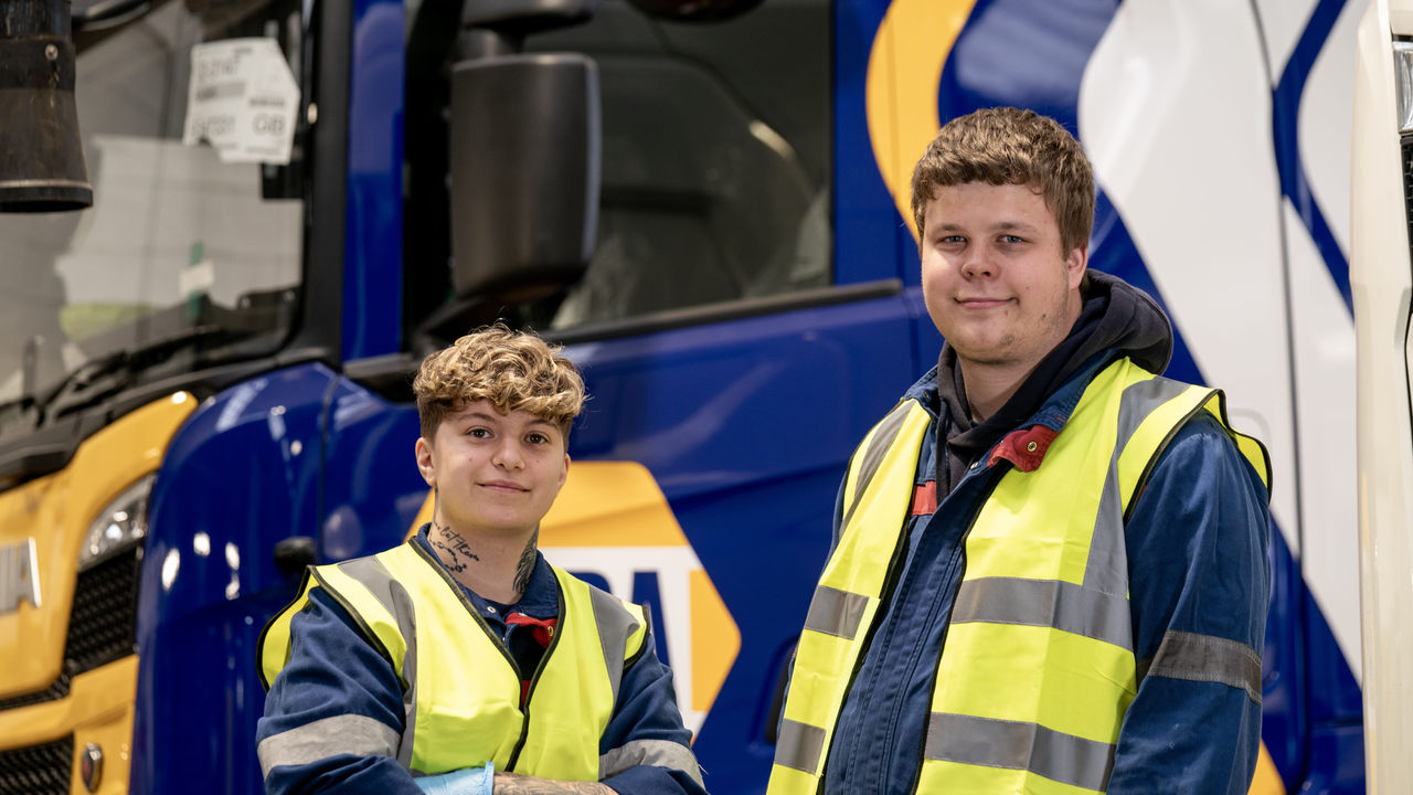 Technician working under a Scania truck