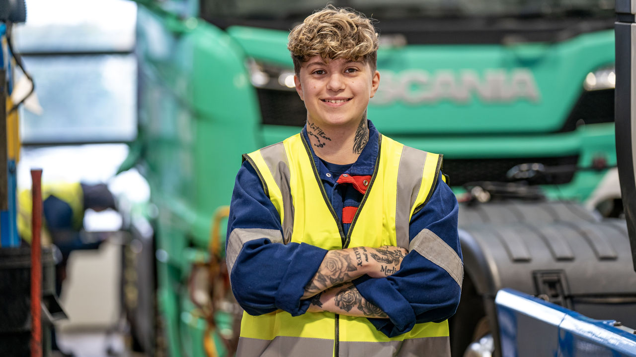 Heavy Vehicle Technician standing in workshop