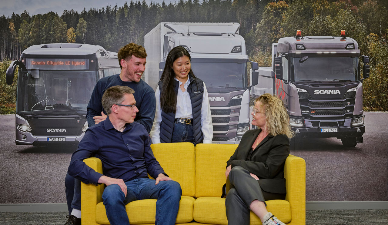 Scania colleauges sat talking