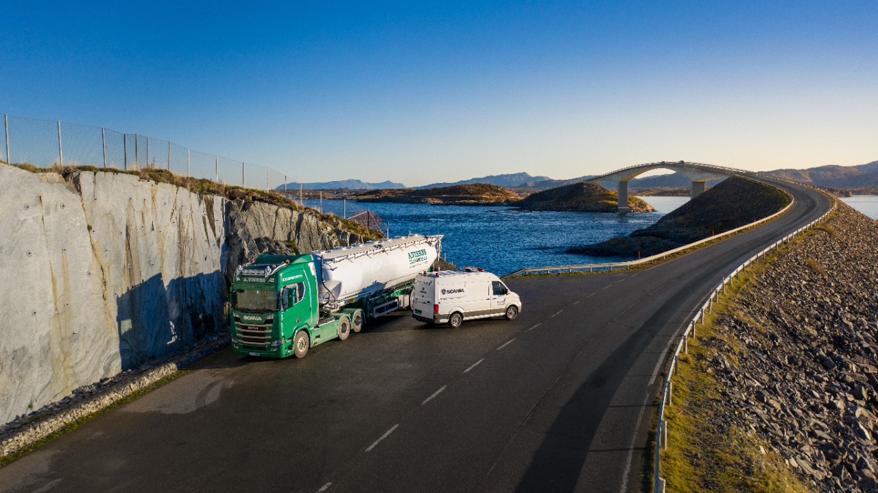 Scania Assistance van on side of the road with a tanker