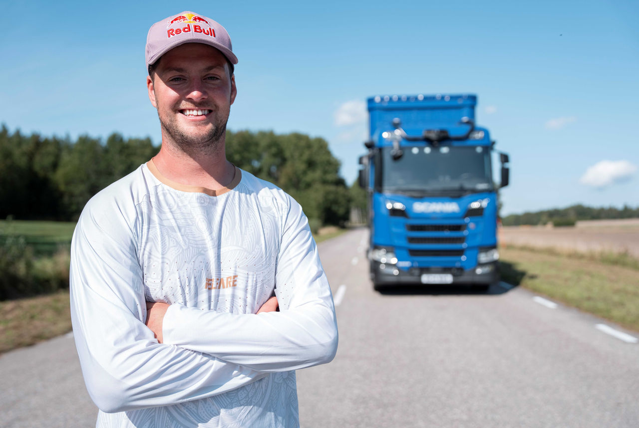 Matt Jones standing in front of Scania truck