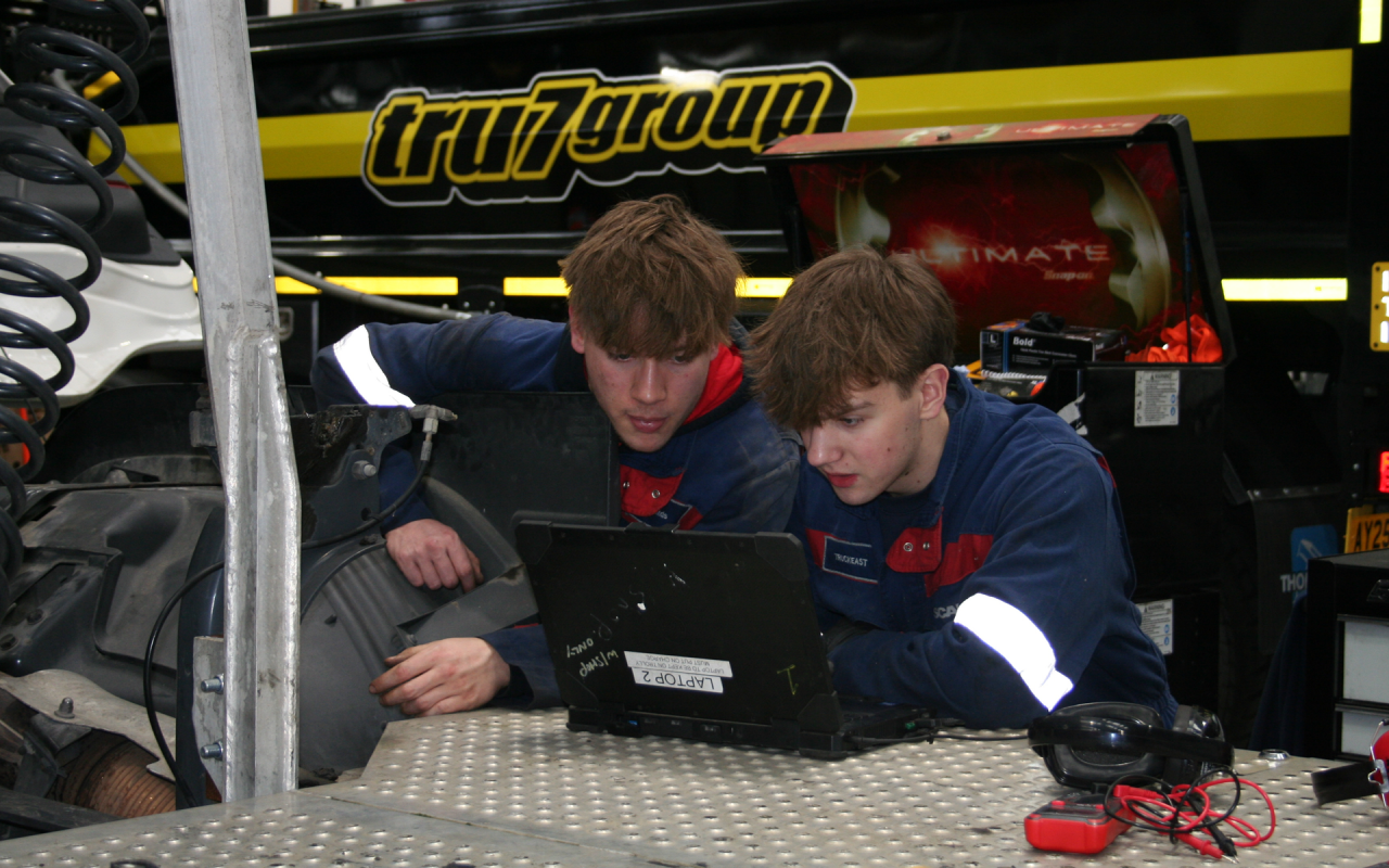 Apprentices working on diagnostics equipment