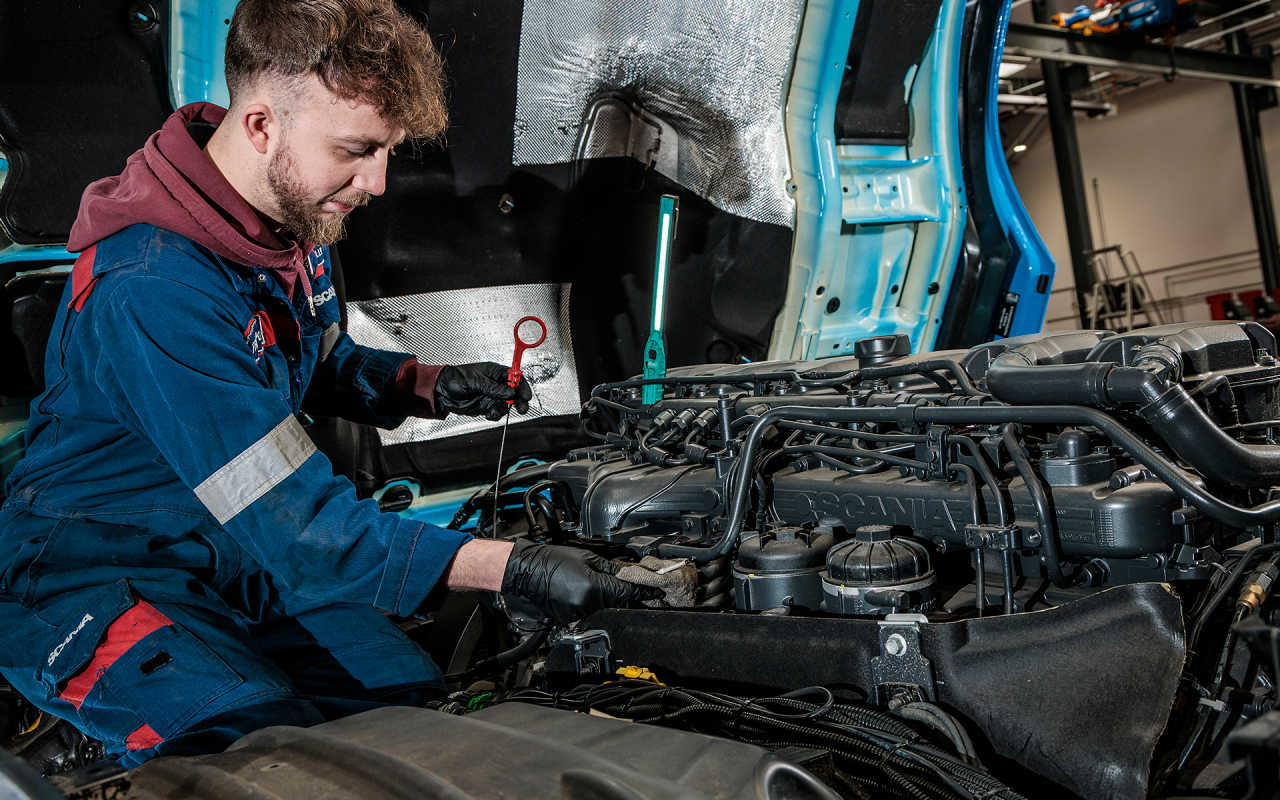 Technician working on engine
