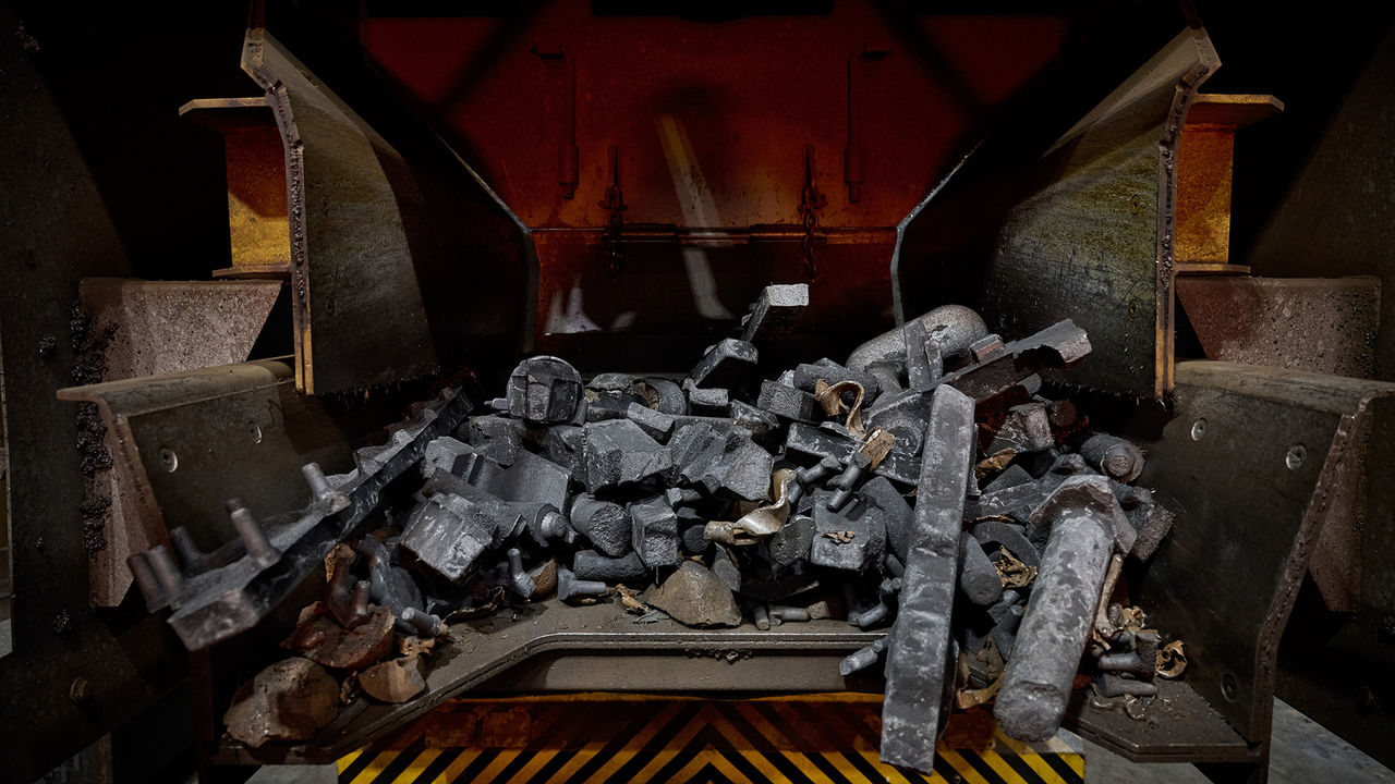 Raw scrap metal in an open truck trailer arriving at Scania’s foundry, ready to be melted down and recycled as part of Scania’s sustainable manufacturing process.